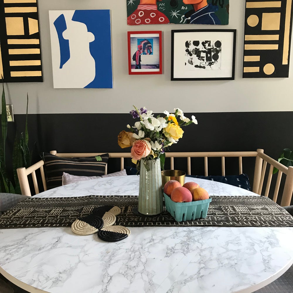 Mudcloth table runner on modern dining table, and and with mudcloth pillows. Perfect for holiday gifts and housewarming gifts, and wedding registries. Fair Trade made in Mali Africa.