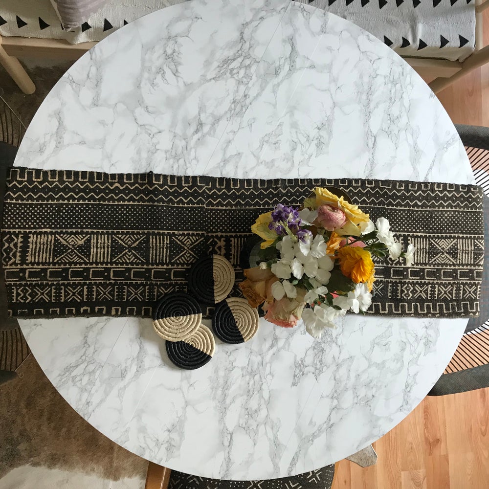 Mudcloth table runner on modern dining table, and and with mudcloth pillows. Perfect for holiday gifts and housewarming gifts, and wedding registries. Fair Trade made in Mali Africa.