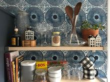 Load image into Gallery viewer, Bohemian chic blue wallpaper in the kitchen with open shelving. Inspired by classic African wax print designs. Also perfect fro mudrooms, entryways, and bedrooms.
