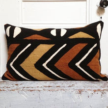Load image into Gallery viewer, Brown, black, and white mudcloth pillows with geometric designs styled on Scandinavian bench. Modern pillows made in USA, designed in Mali
