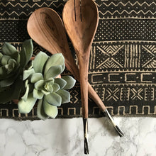 Load image into Gallery viewer, Fair Trade home goods made in Uganda, Sustainable African salad servers for housewarming and wedding registry gifts. Handcarved acacia wood and bone on mudcloth table runner.
