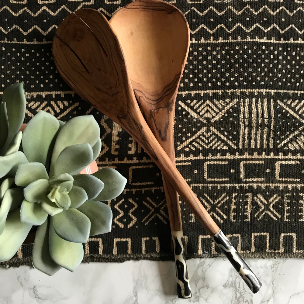 Fair Trade home goods made in Uganda, Sustainable African salad servers for housewarming and wedding registry gifts. Handcarved acacia wood and bone on mudcloth table runner.