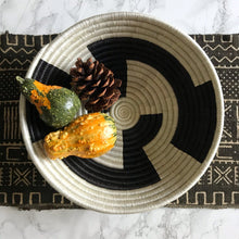 Load image into Gallery viewer, African baskets, Fair Trade made in Uganda. Decorative and African art on modern dining table with mudcloth table runner.
