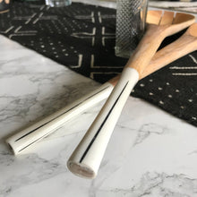 Load image into Gallery viewer, Handcrafted Fair Trade serveware and home goods made in Uganda, Sustainable African salad servers for housewarming and wedding registry gifts. Handcarved acacia wood and bone on mudcloth table runner.
