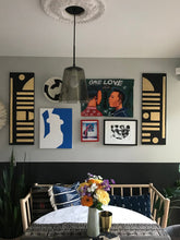 Load image into Gallery viewer, African baskets, Fair Trade made in Uganda. Decorative and African art on gallery wall with mudcloth pillows and table runner.
