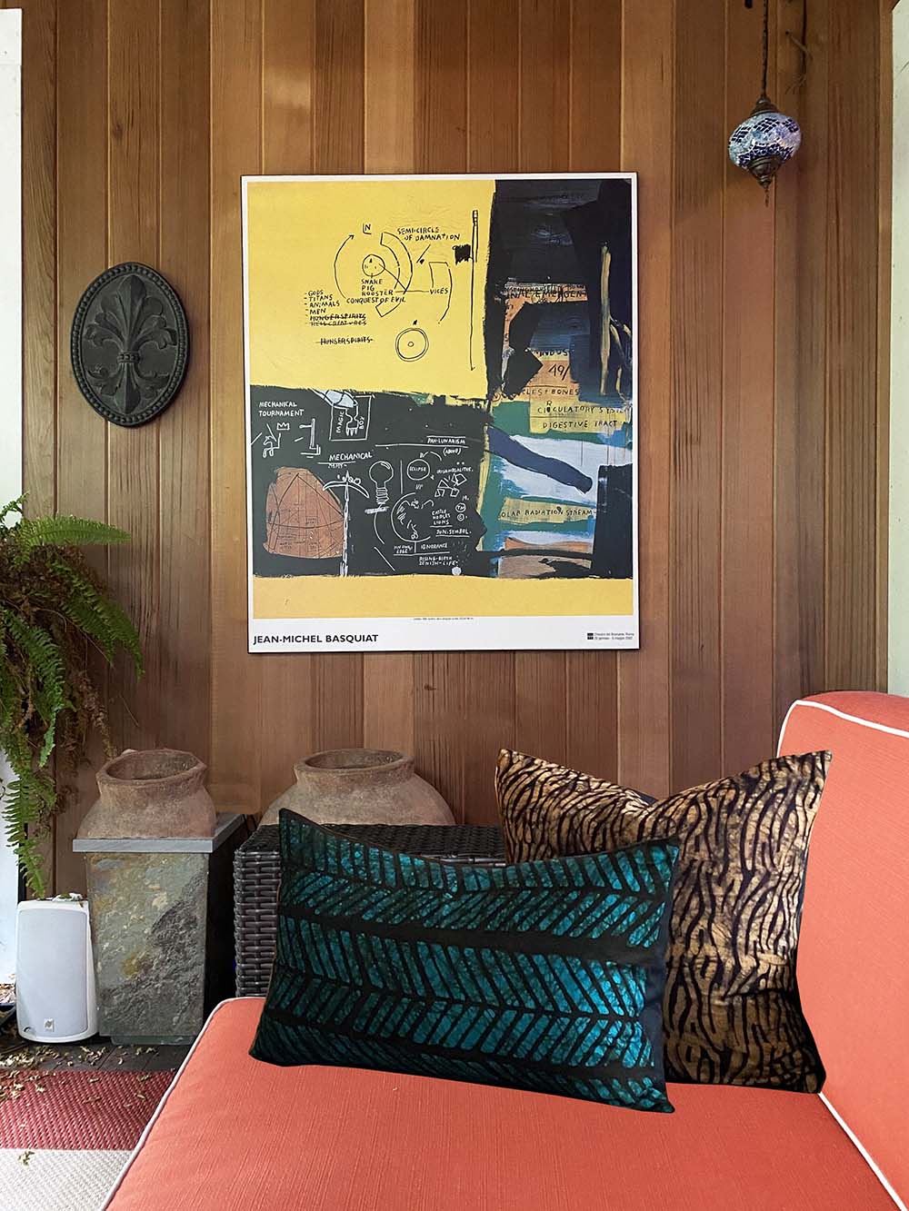 Batik Mwanza pillow in Oak Bluffs, Martha's Vineyard summer home in front of Basquiat painting.Batik Mwanza pillow in Oak Bluffs, Martha's Vineyard summer home in front of Basquiat painting.