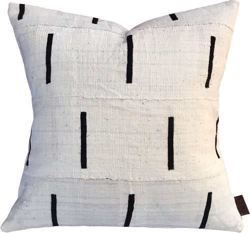 Handcrafted African mudcloth pillow in minimalist white with black designs for modern homes.