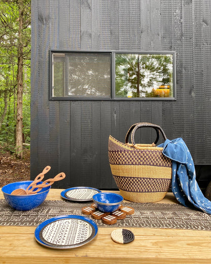 Fair Trade home goods, Sustainable African coasters salad servers for housewarming and wedding registry gifts. Handcarved acacia wood and bone with mudcloth table  runner and Ghana basket.