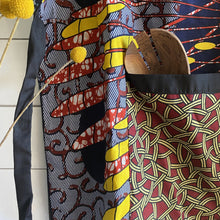Load image into Gallery viewer, Handcrafted African wax print apron made in Uganda. Perfect for housewarming and wedding gitfs. Excellent for entertaining guests during the holidays, Thankgiving, Christmas, and more.
