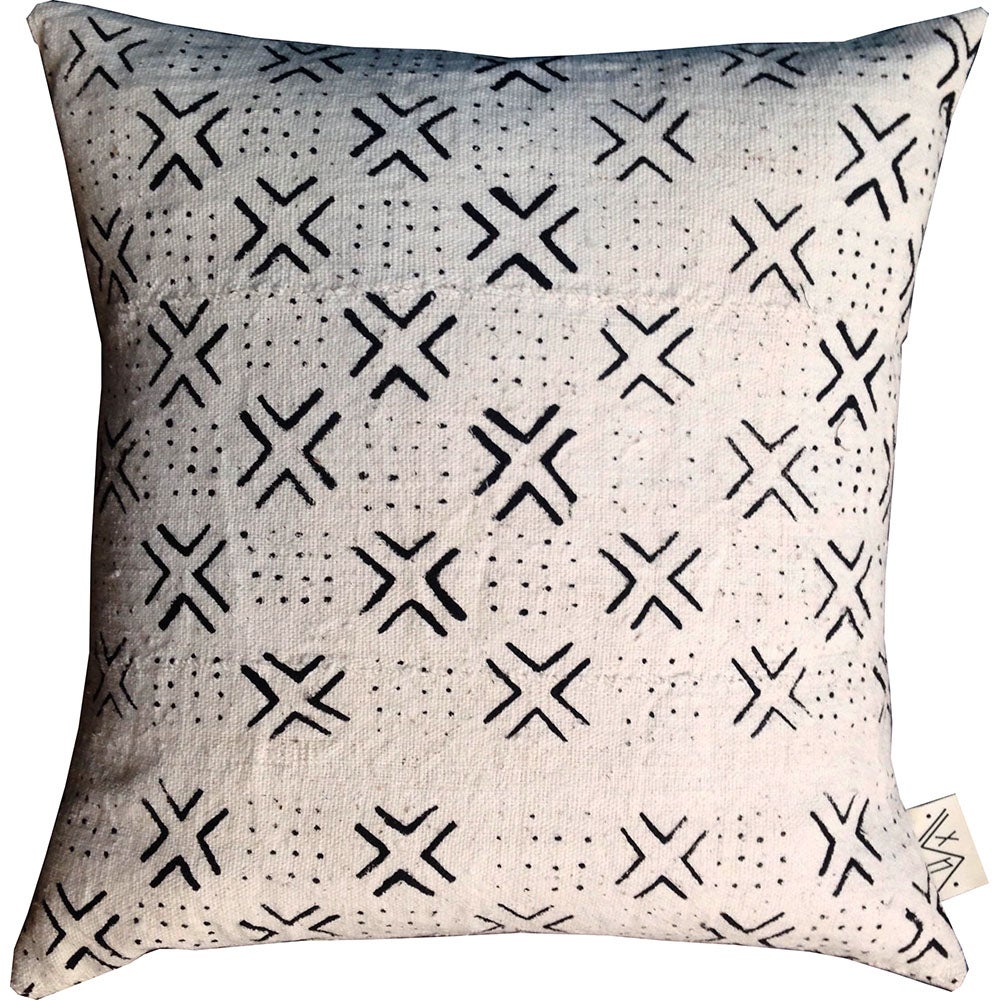 Handcrafted African mudcloth pillow in minimalist white with black design for modern homes. Bohemian chic.